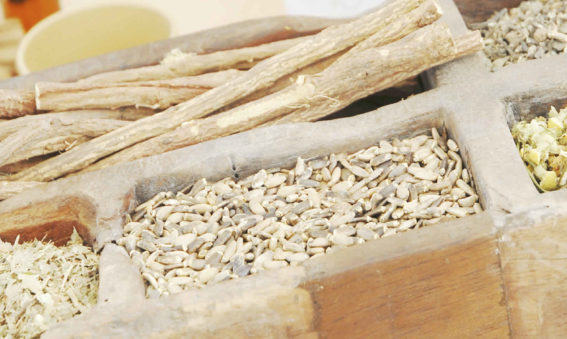 Wooden box with Chinese medicinal herbs